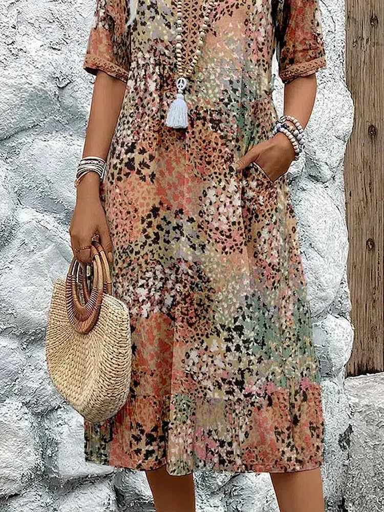 Mirelle | Jurk met V-hals en stijlvolle print