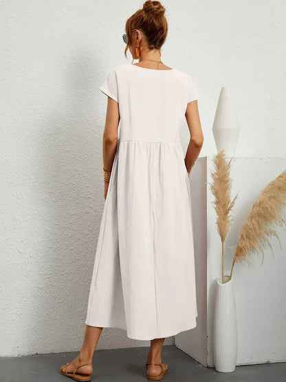 Emilie | Soepelvallende midi-jurk met tijdloze elegantie