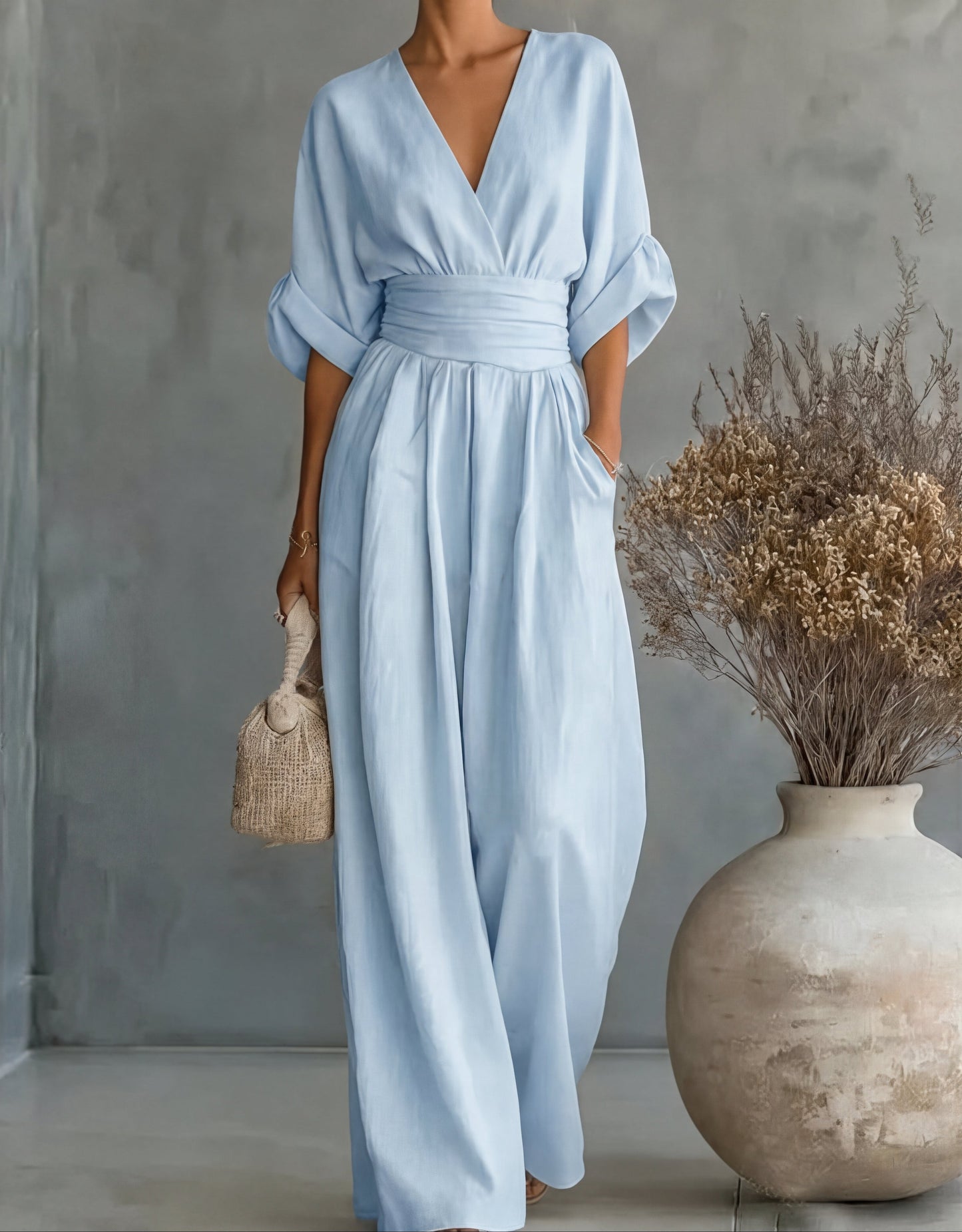 Livia – Elegante jumpsuit met V-hals en wijde pijpen