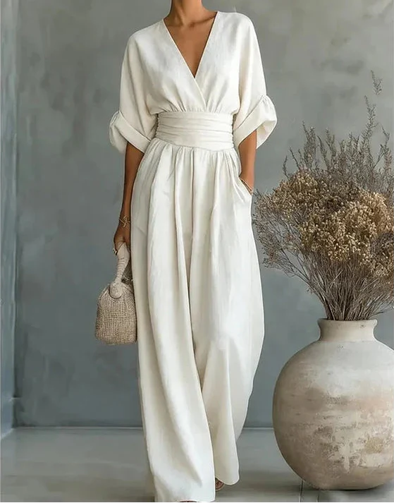 Livia – Elegante jumpsuit met V-hals en wijde pijpen